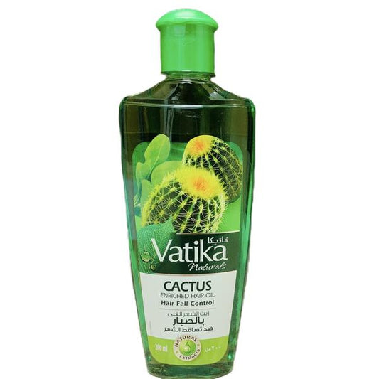 A bottle of Vatika Cactus Enriched Hair Oil with a green cap and a label featuring a cactus. The text on the label includes 'Cactus Enriched Hair Oil' and 'Hair Fall Control'.